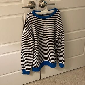Striped Black and White Sweater with Blue Accents